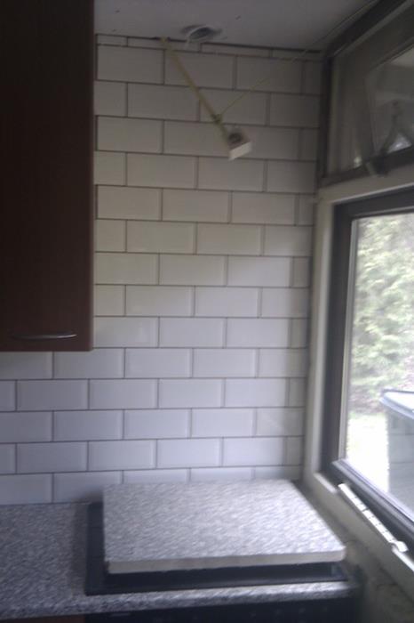 Tegels gevoegd